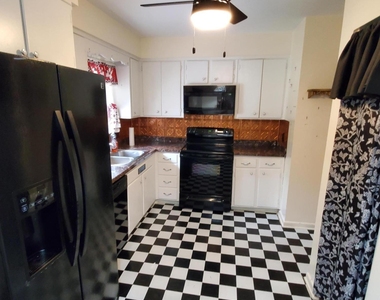 4940 Brighton Drive - Photo Thumbnail 1