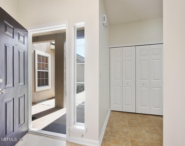 7887 Melvin Road - Photo Thumbnail 1