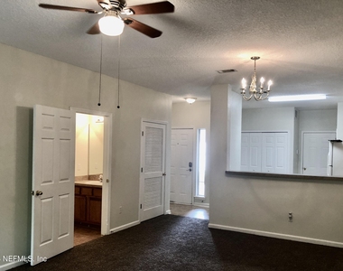 7887 Melvin Road - Photo Thumbnail 2