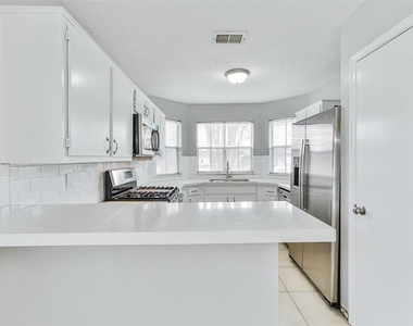 11111 Wheatridge Drive - Photo Thumbnail 4