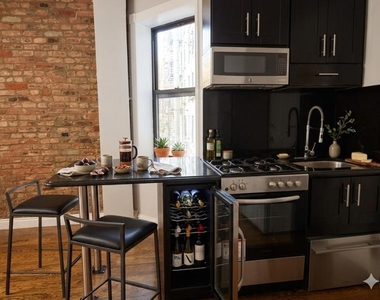 E 5th St. - Photo Thumbnail 5