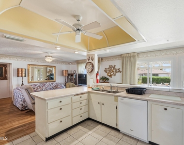 9807 W Mockingbird Drive - Photo Thumbnail 10