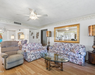 9807 W Mockingbird Drive - Photo Thumbnail 9