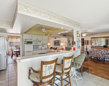 9807 W Mockingbird Drive - Photo Thumbnail 13