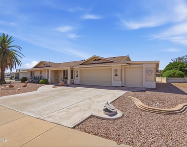 9807 W Mockingbird Drive - Photo Thumbnail 1