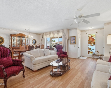 9807 W Mockingbird Drive - Photo Thumbnail 2