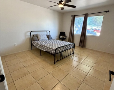 12624 N 105th Avenue - Photo Thumbnail 3