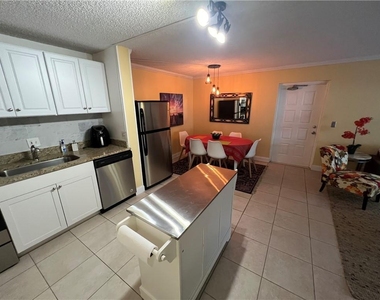 1009 Green Pine Boulevard - Photo Thumbnail 2