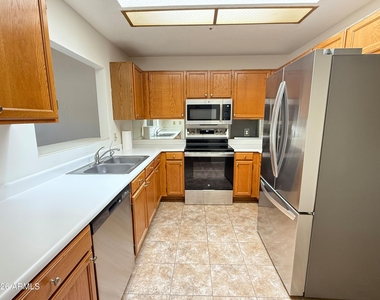 11766 E Becker Lane - Photo Thumbnail 4