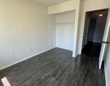 8338 Woodley Place - Photo Thumbnail 8