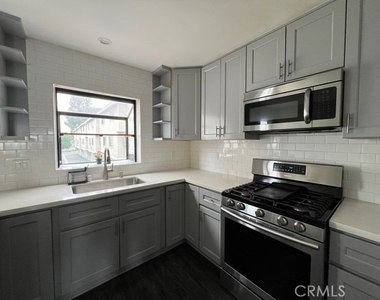 8338 Woodley Place - Photo Thumbnail 1