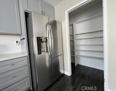 8338 Woodley Place - Photo Thumbnail 3