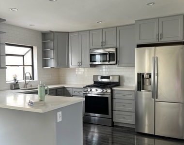 8338 Woodley Place - Photo Thumbnail 2
