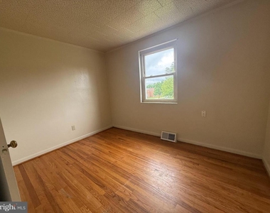 207 E Whitlock Avenue - Photo Thumbnail 3