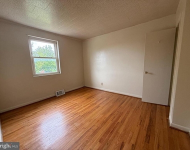 207 E Whitlock Avenue - Photo Thumbnail 4