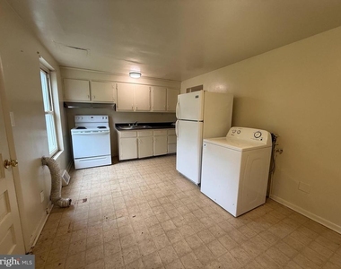207 E Whitlock Avenue - Photo Thumbnail 2