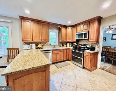 12525 Hedges Run Drive - Photo Thumbnail 12
