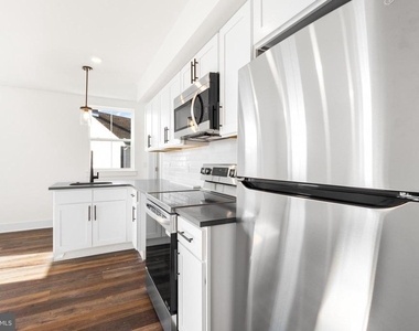 7037 Ridge Avenue - Photo Thumbnail 3