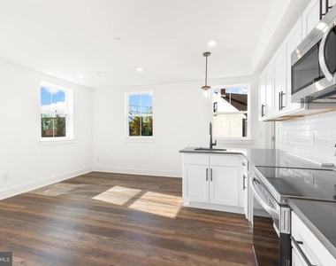 7037 Ridge Avenue - Photo Thumbnail 1