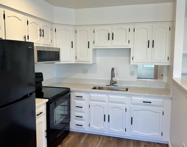 7044 Basswood Road - Photo Thumbnail 3