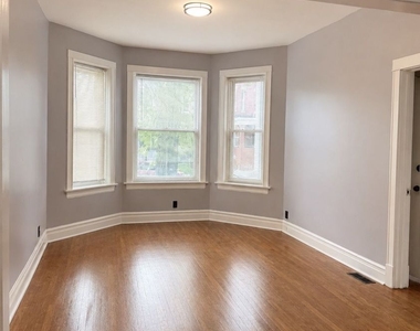 7031 S Laflin Street - Photo Thumbnail 1