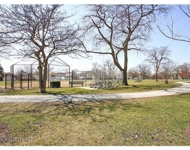 7217 W Fitch Avenue - Photo Thumbnail 2