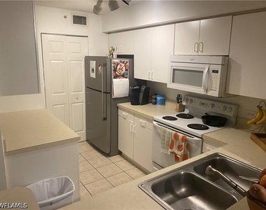 8940 Colonnades Court E - Photo Thumbnail 1