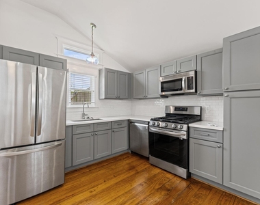 732 E 12th 1/2 Street - Photo Thumbnail 4