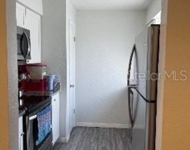 7210 N Manhattan Avenue - Photo Thumbnail 6