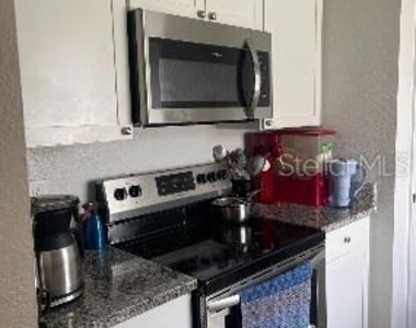 7210 N Manhattan Avenue - Photo Thumbnail 7
