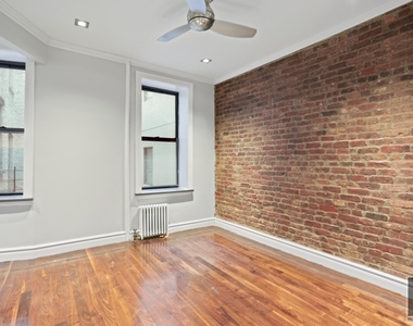 E 13th St. - Photo Thumbnail 4