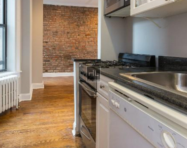E 13th St. - Photo Thumbnail 1