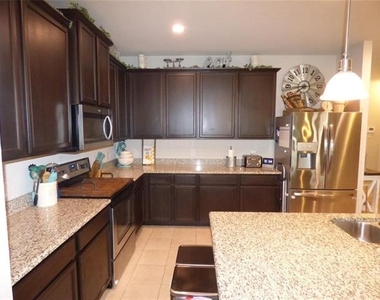 7416 Boat Wind Road - Photo Thumbnail 5