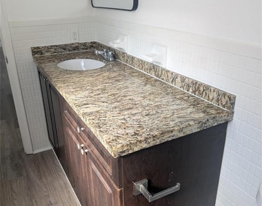 5861 Nw 16th Place - Photo Thumbnail 3