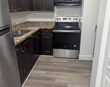 5861 Nw 16th Place - Photo Thumbnail 1