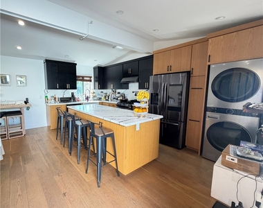 7257 Wilbur Avenue - Photo Thumbnail 1