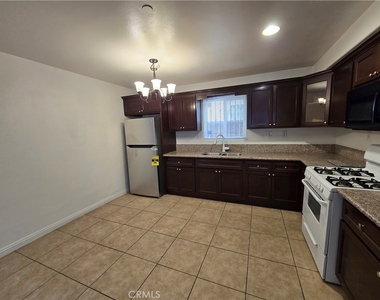 10218 S San Pedro - Photo Thumbnail 4
