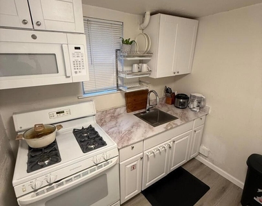 1242 88th Ave - Photo Thumbnail 2