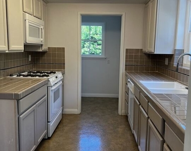 130 S Bowling Green Way - Photo Thumbnail 2