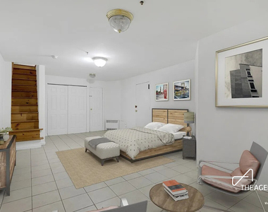 242 W 21st Street - Photo Thumbnail 2