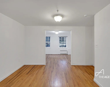 242 W 21st Street - Photo Thumbnail 1