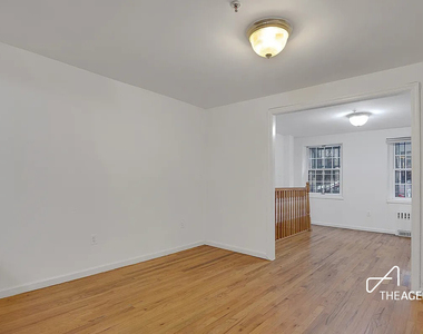242 W 21st Street - Photo Thumbnail 6