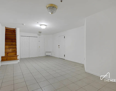 242 W 21st Street - Photo Thumbnail 3