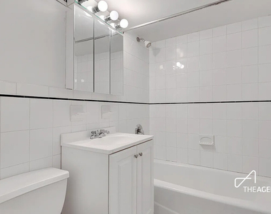 242 W 21st Street - Photo Thumbnail 7