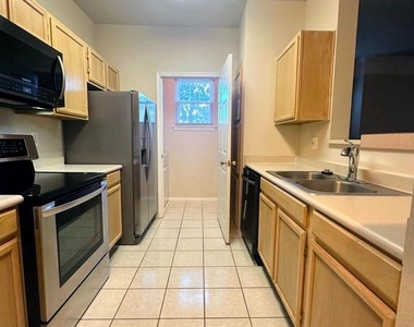 1600 Spring Gate Drive - Photo Thumbnail 1