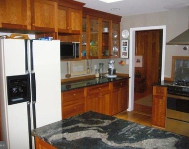 9001 Southwick Street - Photo Thumbnail 4