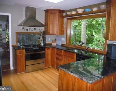 9001 Southwick Street - Photo Thumbnail 1
