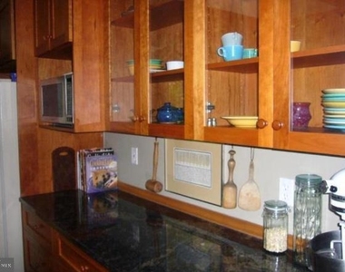 9001 Southwick Street - Photo Thumbnail 2
