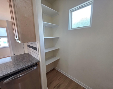 100 E 7th St - Photo Thumbnail 3