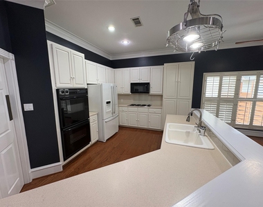 1204 W 39th St - Photo Thumbnail 13